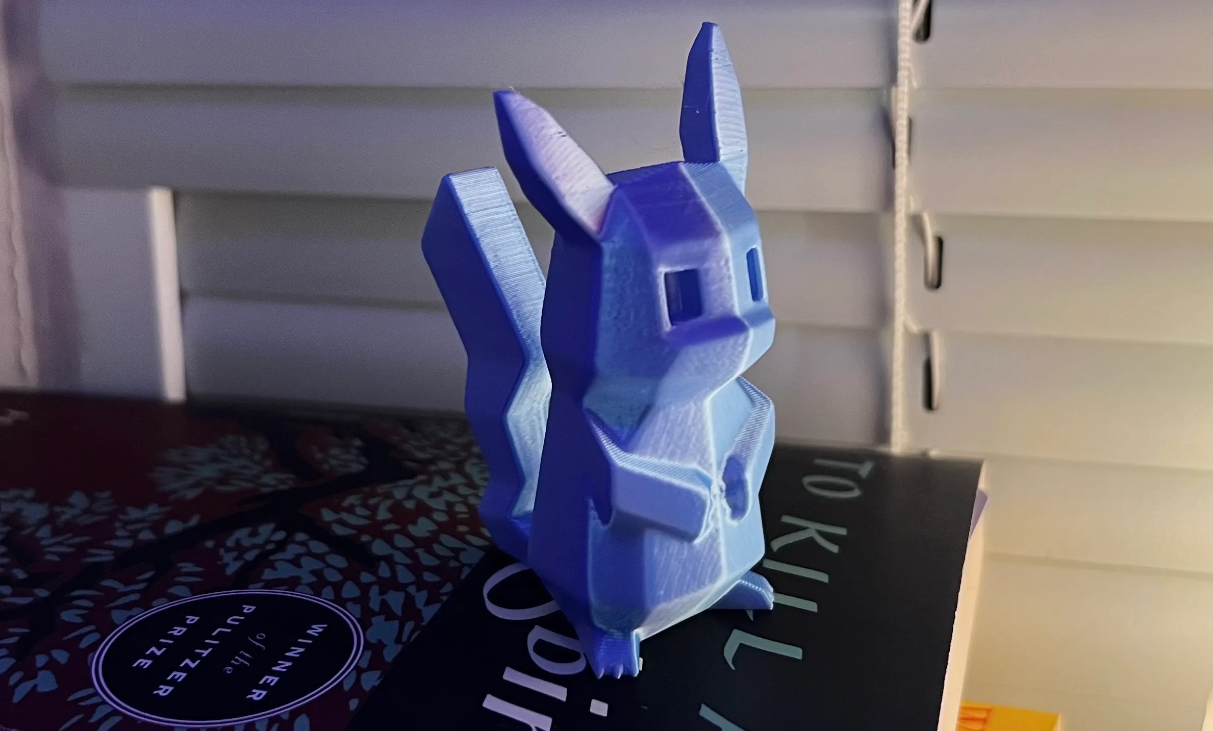 A low-poly Pikachu print